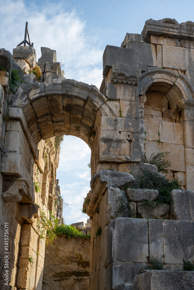 Fototapeta premium Ruins Myra Ancient City in Demre to Antalya, archaeology landmarks of Turkey. Remains of theatre in Myra, Greco-Roman ancient city in Antalya, Turkey.