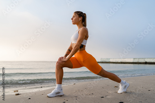 pretty young smiling woman doing sports in the morning in stylish sport outfit sportswear, skinny strong body, healthy fit lifestyle