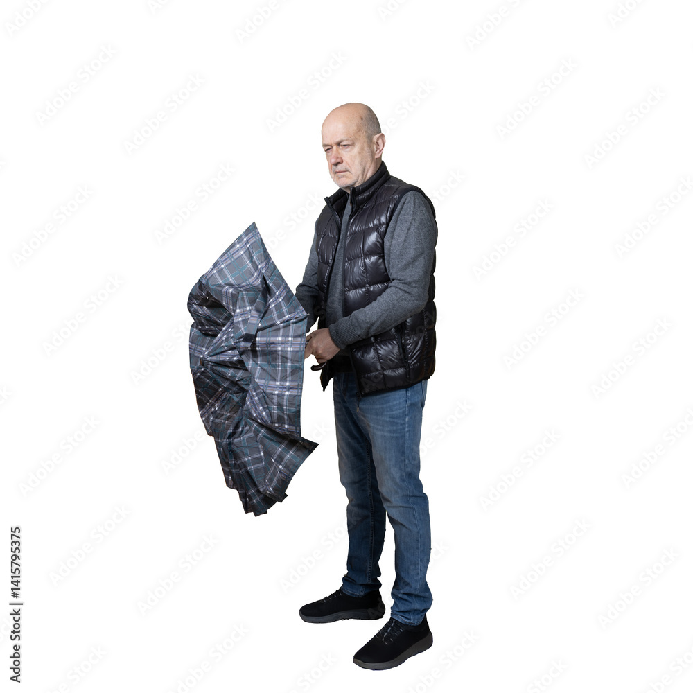 a man closing his umbrella