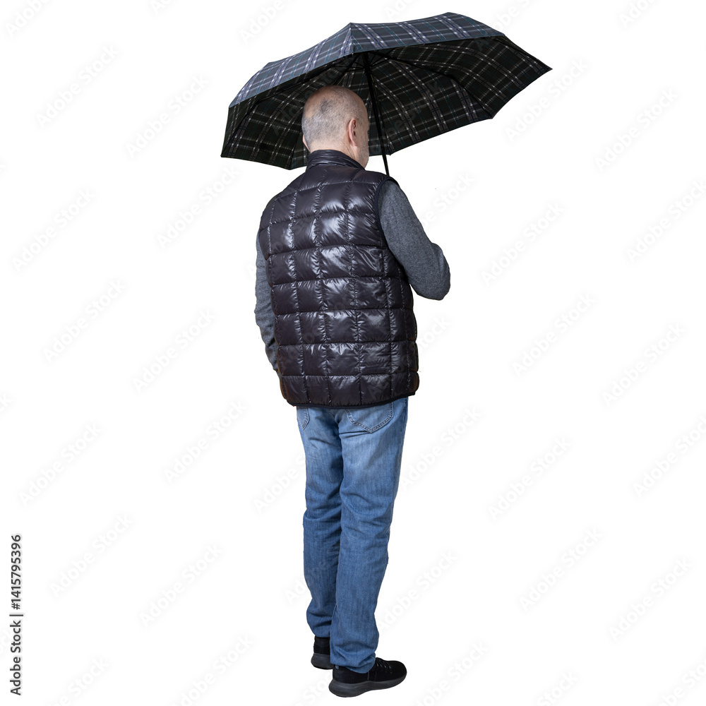 a man with an open umbrella in his hand while walking