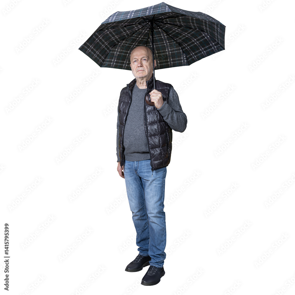 a man with an open umbrella in his hand while walking