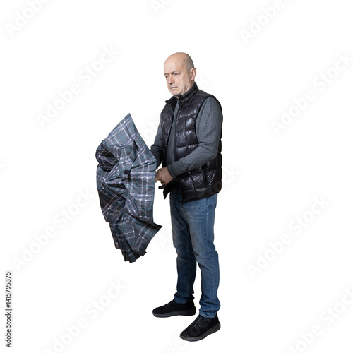 Obraz na płótnie a man closing his umbrella w salonie