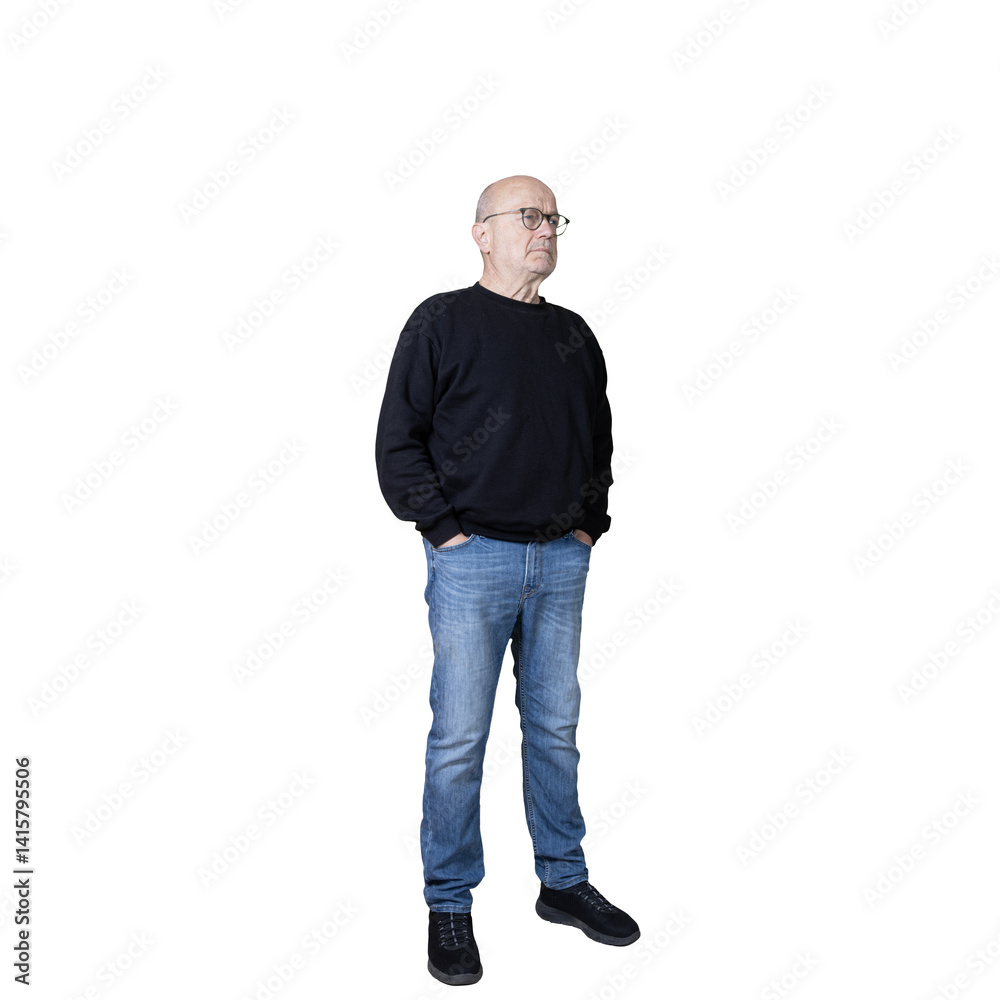 a man with his hands in his pockets while reflecting