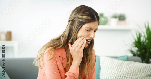 Tableau sur toile Frustrated woman, pain and infection with tooth ache for dental issue, oral or gum disease at home