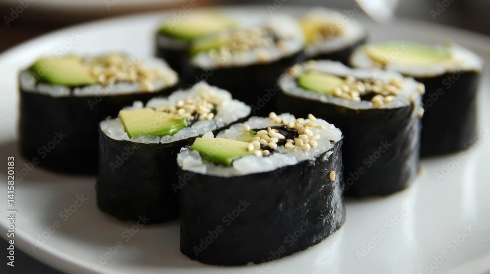 Sushi Rolls with Sesame and Avocado Slices Sushi Rolls with Sesame and Avocado Slices