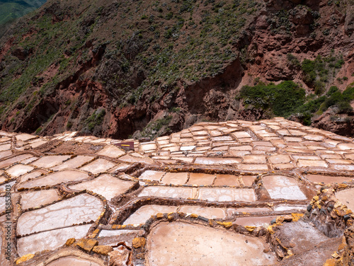 Obraz na płótnie The Maras Salt Mines are a Complex of More than 3,000 Natural Salt Ponds, Located in the Sacred Valley of the Incas, near Cusco, Peru w salonie