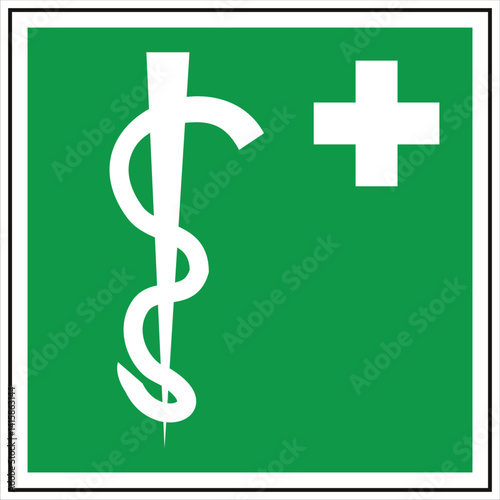 International first aid symbol featuring rod of asclepius and white cross on green background, indicating location of medical assistance