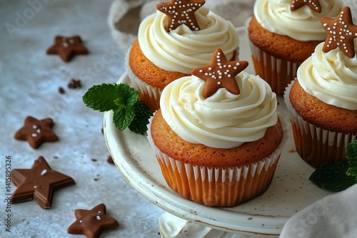 Delicious Cupcakes Topped With Star-Shaped Cookies and Whipped Cream Placed o...
