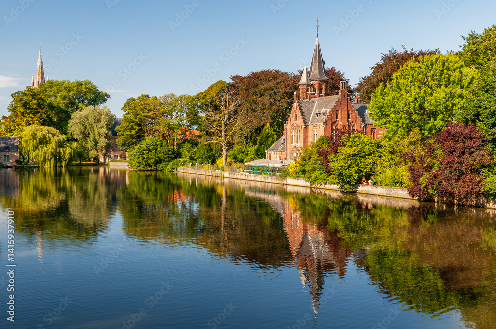 An old historic church Castillo de La Faille by the Minne lake in Bruge, Belgium. An old historic church Castillo de La Faille by the Minne lake in Bruge, Belgium.