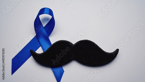Pair of novelty mustaches with blue awareness ribbons attached, used to promote a cause.