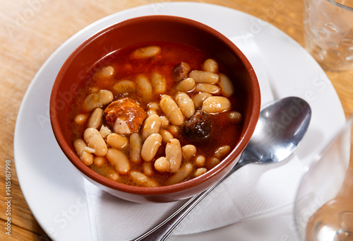 Obraz na płótnie Asturian fabada soup with white beans and blood sausage served in bowl w salonie