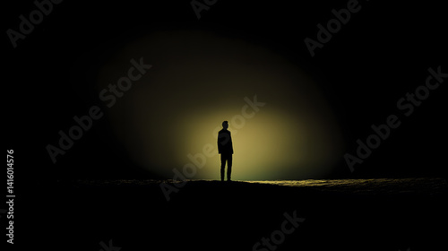Solitary Silhouette: a mysterious silhouette of a person stands alone, illuminated by a single spotlight casting a dramatic shadow. The ambiance evokes deep emotions and introspection.