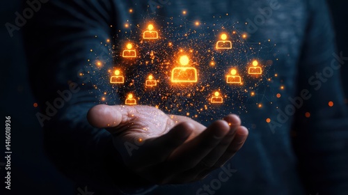 A male in a dark setting showcases a glowing network of digital people icons in his open palm, symbolizing connection.