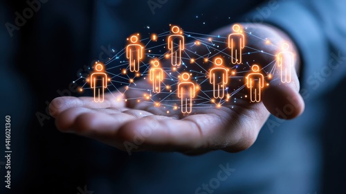 A business professional showcases a network of human icons in their hand, symbolizing connection and collaboration.