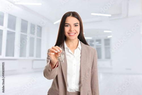 Real estate agent with house key in room Free Download Real estate agent with house key in room - GFXLoad