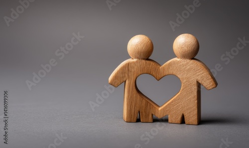 Obraz na płótnie Wooden Couple Figure with Heart Cutout on Gray Background for Romantic Decor and Concept w salonie