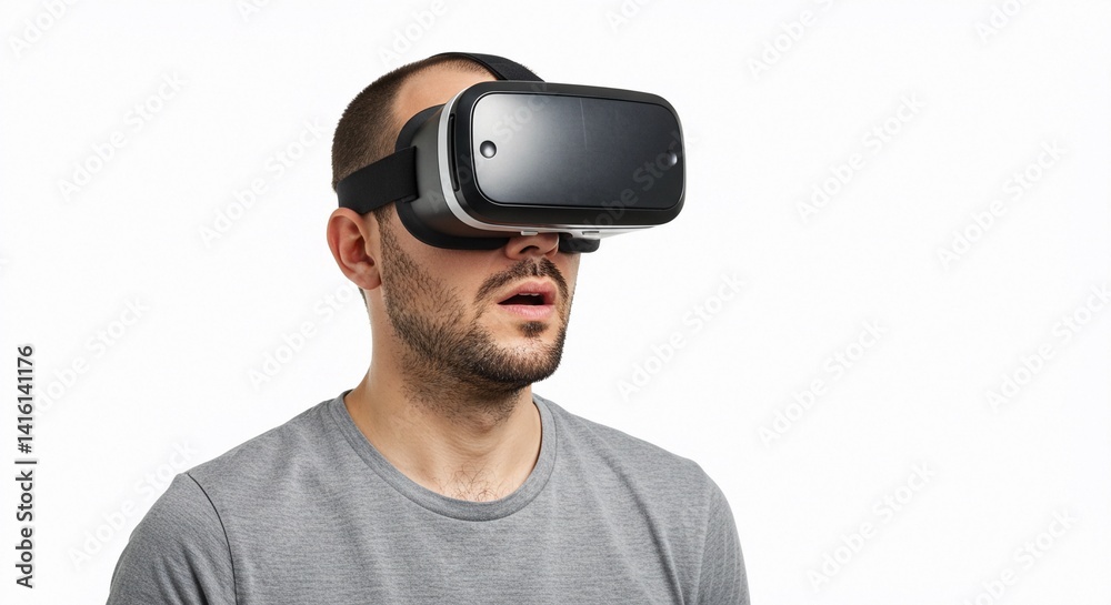 Man with beard wearing a gray shirt and virtual reality headset looking surprised on a white background Man with beard wearing a gray shirt and virtual reality headset looking surprised on a white background
