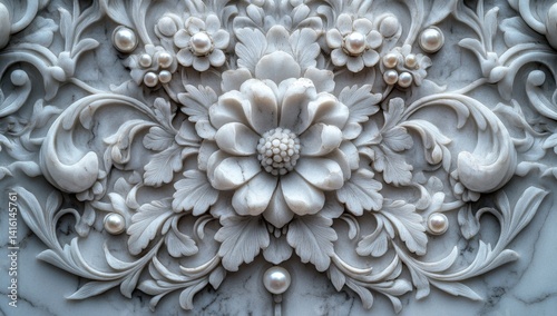 Intricate white marble floral carving with pearls.