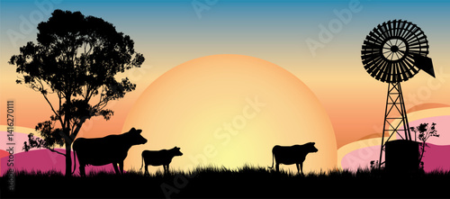 outback country Australia, Silhouette of Cows at Sunset with Windmill