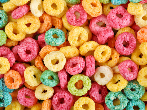 colorful cereal rings on background.