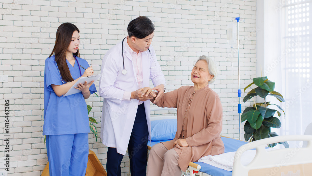 Fototapeta premium Asian senior woman sit on bed while consulting with doctor and caring nurse checking in hospital, Healthcare elderly patient and medical professional support muscle injury consultation wellness being.