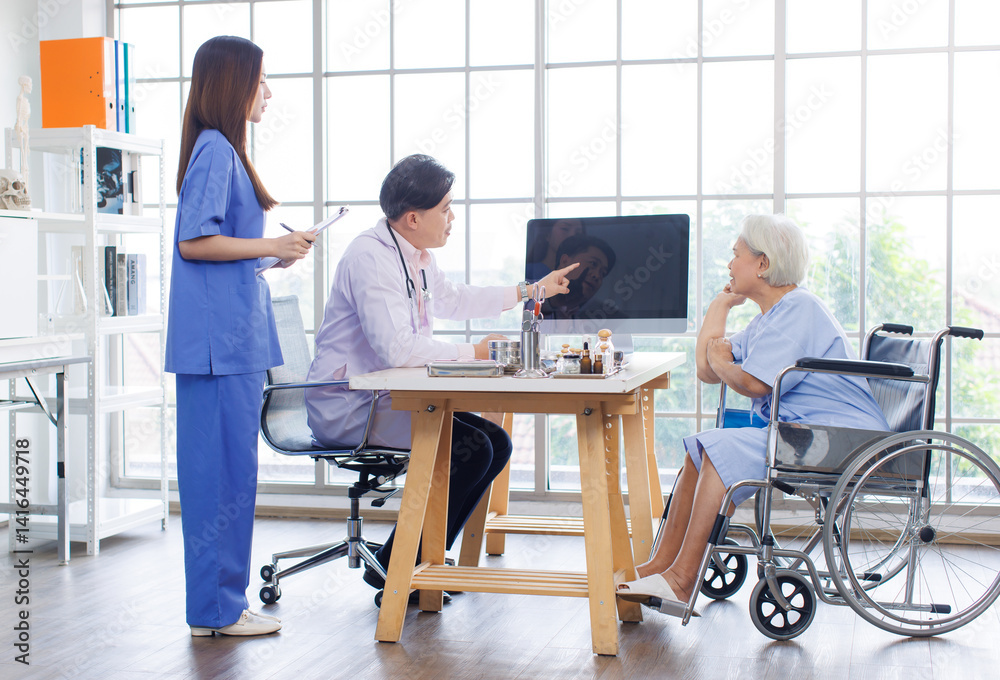 Asian male doctor and caring nurse holding a clipboard talking to old woman patient about ways of treating diagnosis. Healthcare elderly senior consultation medical professional wellness being concept