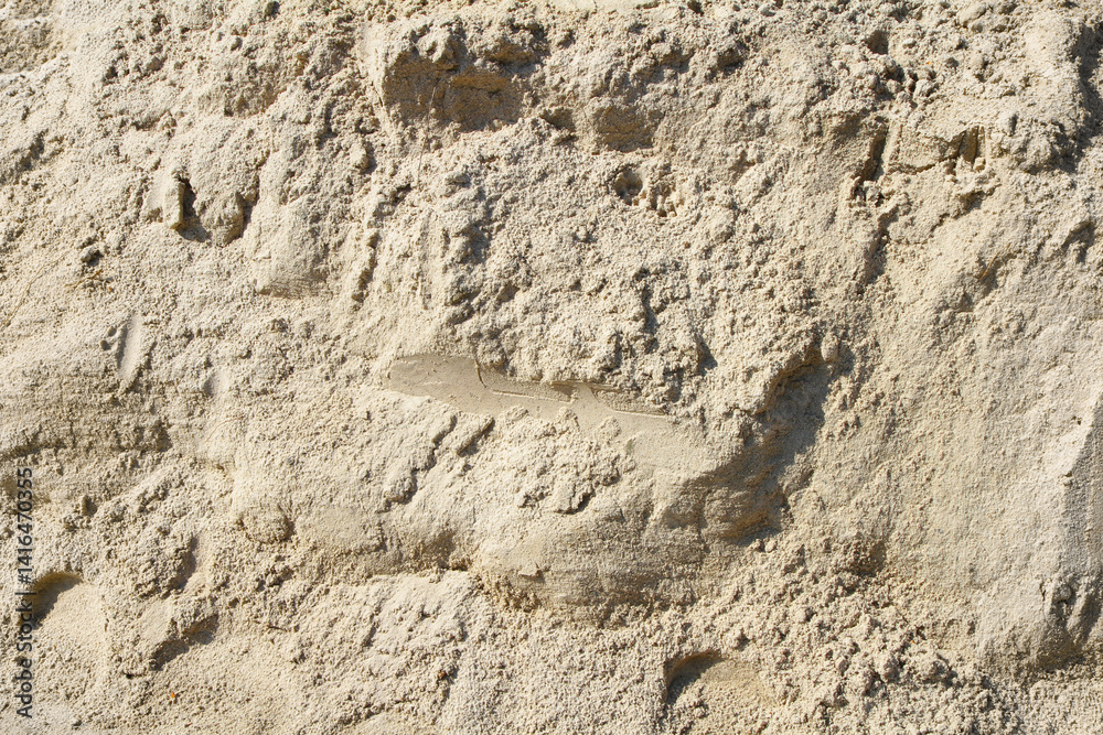 Natural yellow sand texture. Sand is a building material. Natural yellow sand texture. Sand is a building material.
