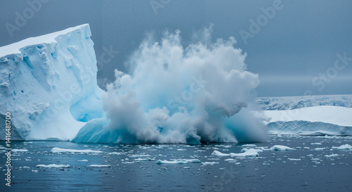 Dynamic Arctic Iceberg Calving in Cool Blues and Greys