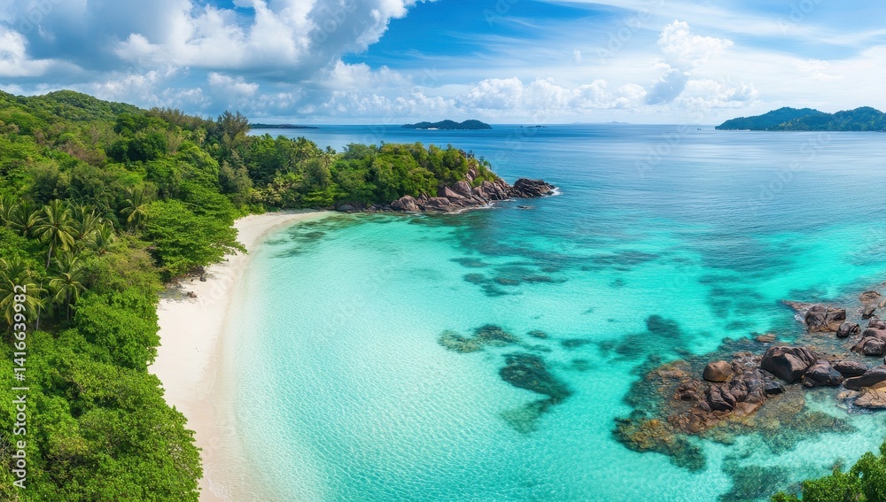 Fototapeta premium Serene Tropical Beach with Turquoise Water and Lush Green Vegetation Under a Bright Blue Sky with Puffy Clouds