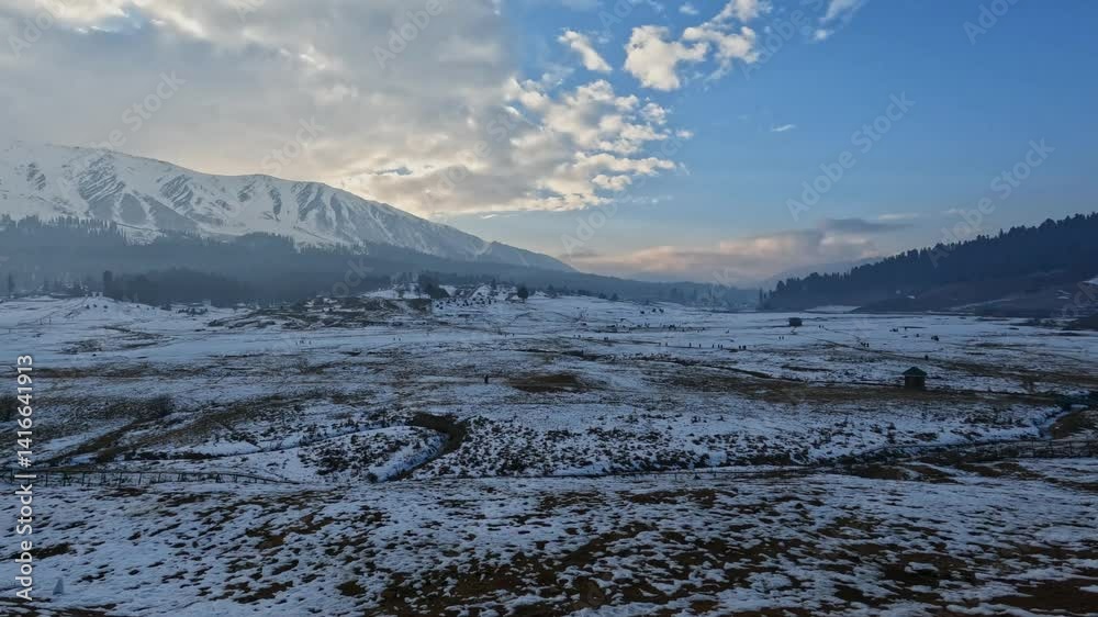 snow with hill mountains, sky, clouds and trees at day time, pan shot, 4k. snow with hill mountains, sky, clouds and trees at day time, pan shot, 4k.