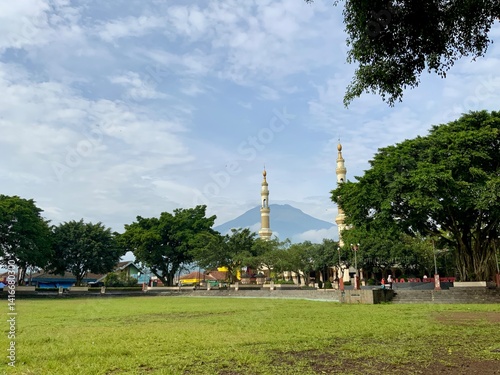 The atmosphere of the temanggung square, you can see the cleft mountain and the tower of the Darussalam Agung mosque. photo