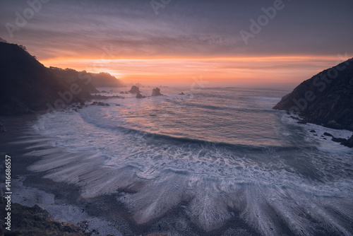 Sunset in the bay. Sunset falls on the bay as the tide rises.