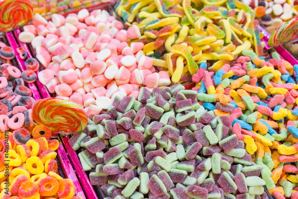 Colorful gummy candy assortment in market display