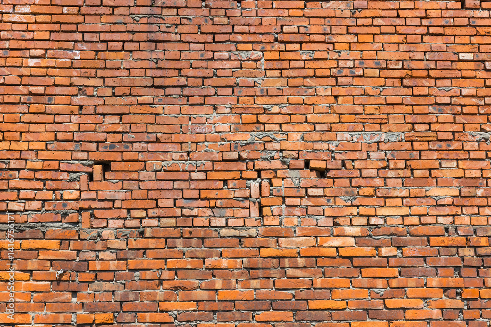Close up view of old red brick wall texture