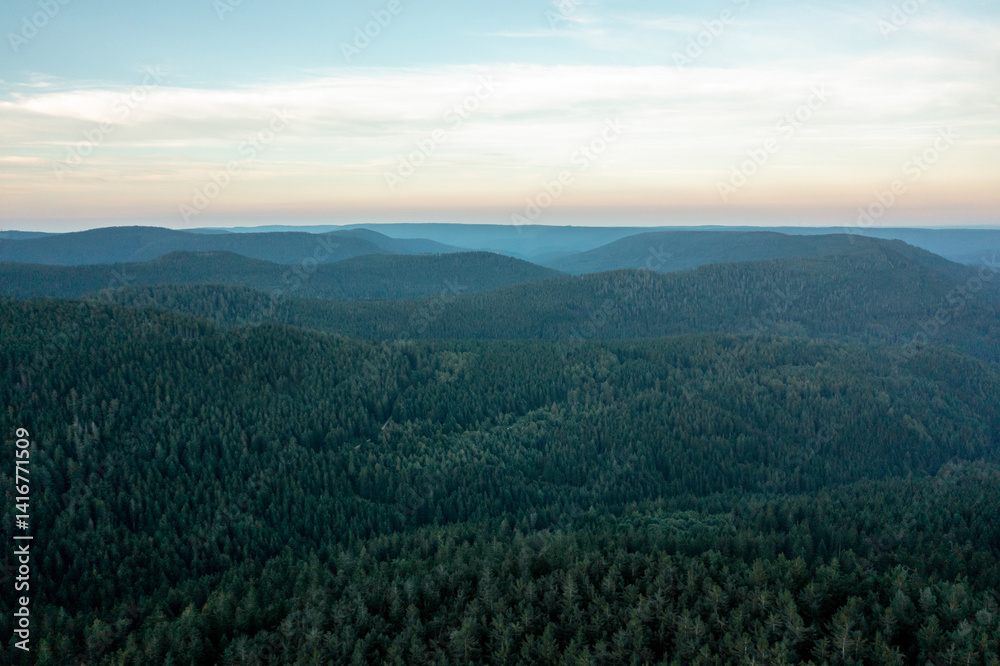 Naklejka premium Black Forest drone aerial view, horizon over mountains in the evening