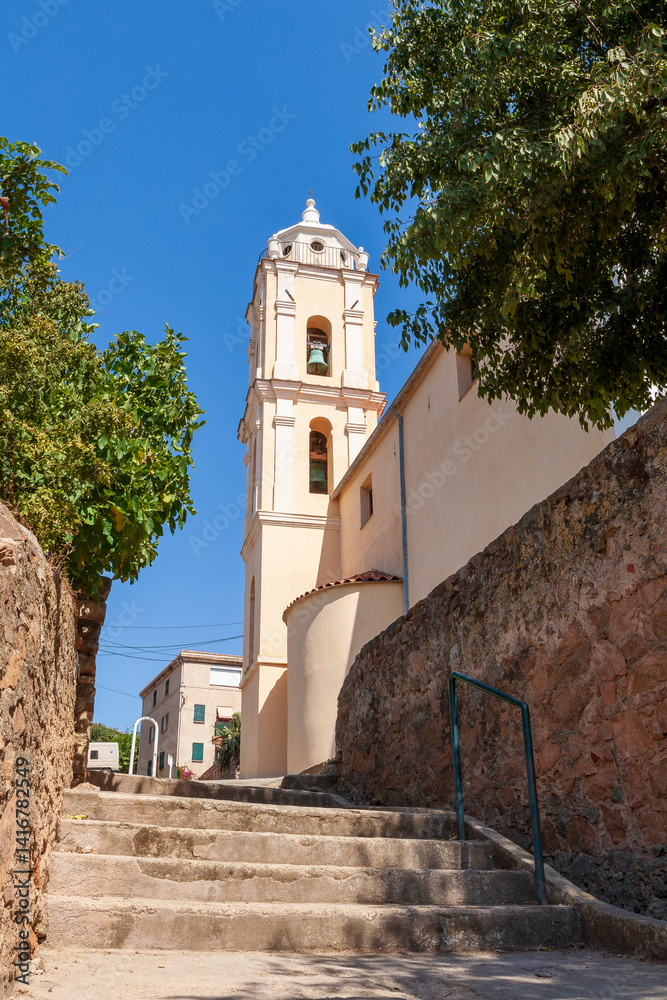 Fototapeta premium Latin church, in Cargèse, Corsica, France. Typical and picturesque hillside village. Hilltop town nestled on the coast above the Mediterranean sea.