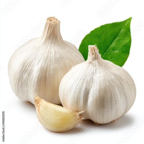 Two garlic bulbs with leaf on white background