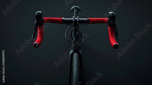 Sleek gravel bike with vibrant red handlebar tape against a dark backdrop
