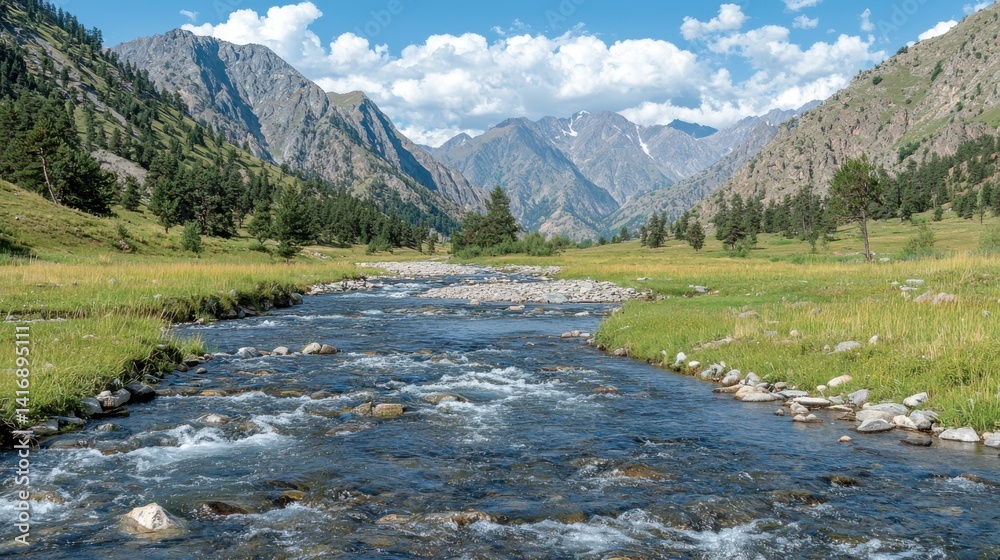 Fototapeta premium Mountain river valley. Lush green meadow and distant snowcapped peaks under a blue sky
