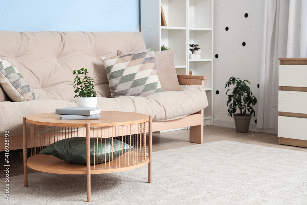 Interior of modern living room with cozy sofa and coffee table