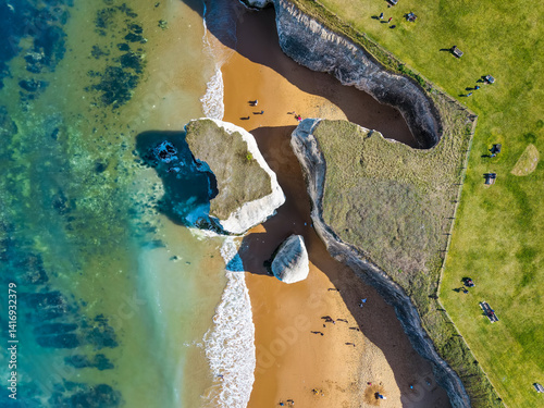Obraz na płótnie Aerial overhead view of the white chalk cliffs sitting in the ocean at Botany Bay, Kent, England w salonie