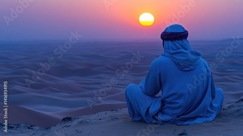 Man in flowing robes meditates atop a sand dune, watching a vibrant sunset over endless desert ripples