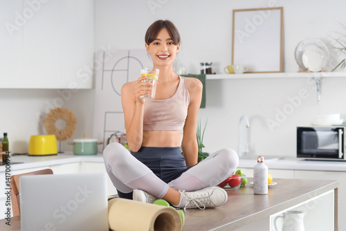 Sporty young woman with gla...
