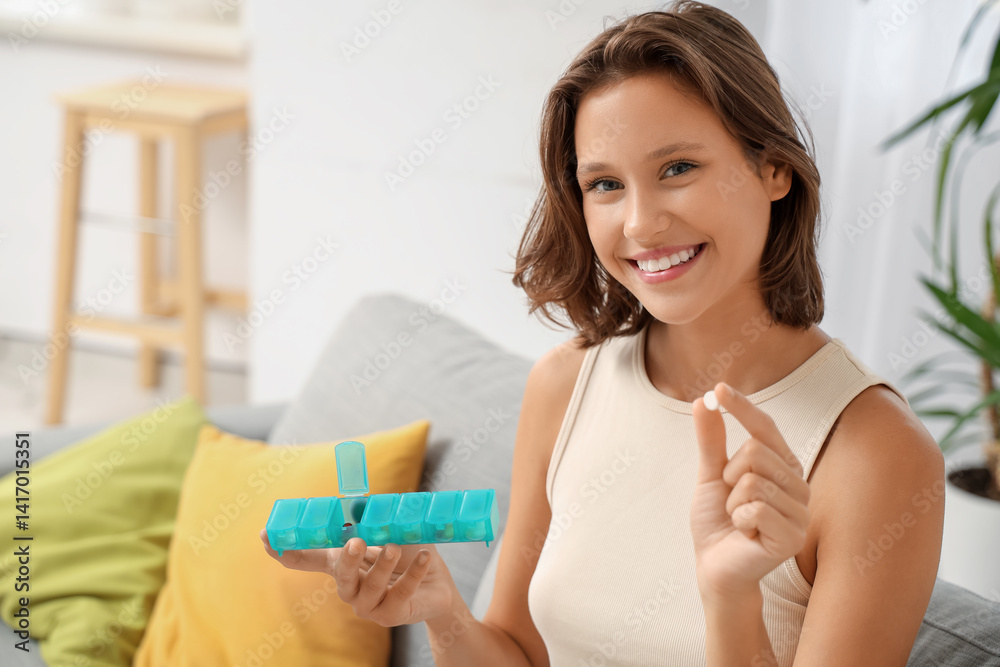 Pretty young woman with pill organizer at home Pretty young woman with pill organizer at home