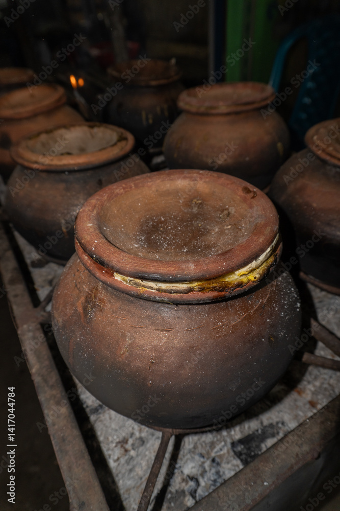 Earthen Clay Pots Cooking Vessels on Stove Top Traditional Kitchenware Earthen Clay Pots Cooking Vessels on Stove Top Traditional Kitchenware