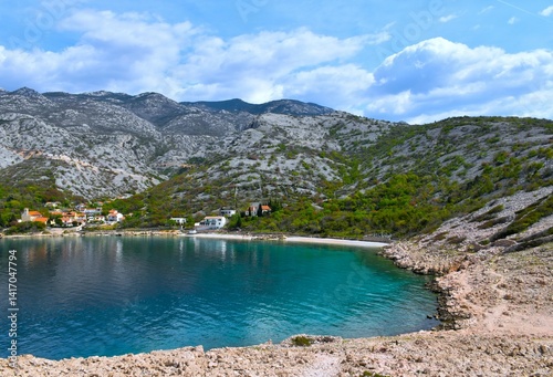 Fototapeta Naklejka Na Ścianę i Meble -  Bay at the Adriatic sea ext to Lukovo village bellow rocky slopes of Velebit mountains in Croatia
