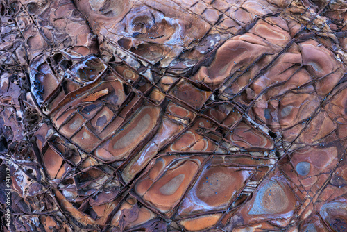 Incredible erosion patterns on rocks along the shore, Thailand