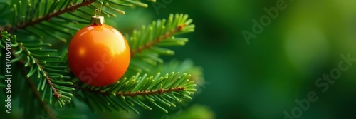 Obraz na płótnie Glossy orange sphere adorns lush evergreen branch , xmas, celebration w salonie