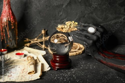 Bloody witch hand with crys...