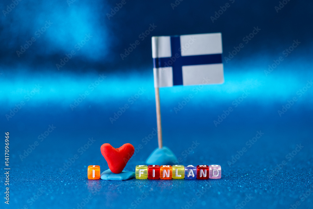 Celebration of Finland with colorful decorations and an I love Finland message on a shiny surface